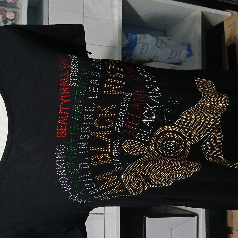 Black Graphic T-Shirt with Gold and Red Accents